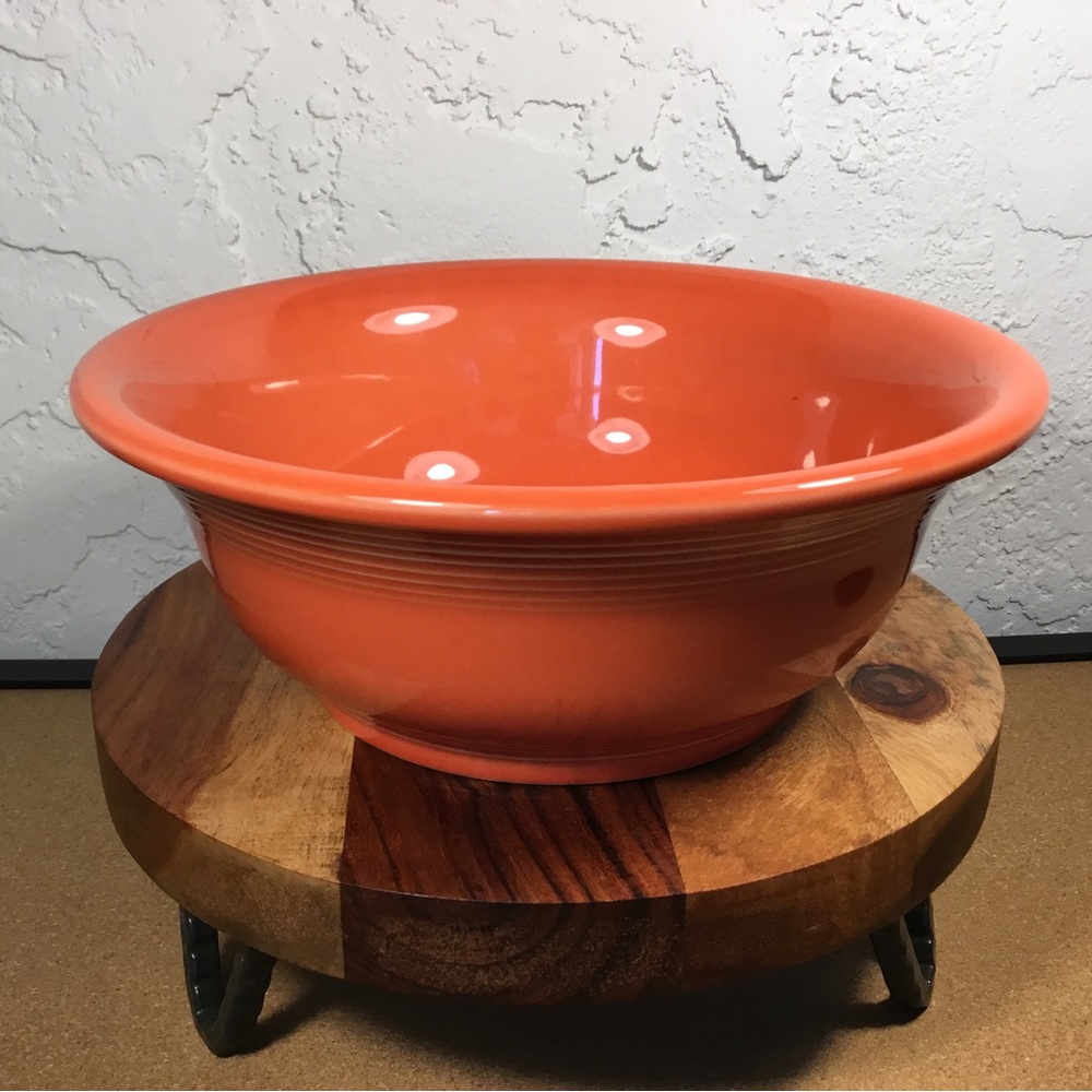 Fiesta ware Persimmons large mixing bowl- has a factory flaw on base- see photo